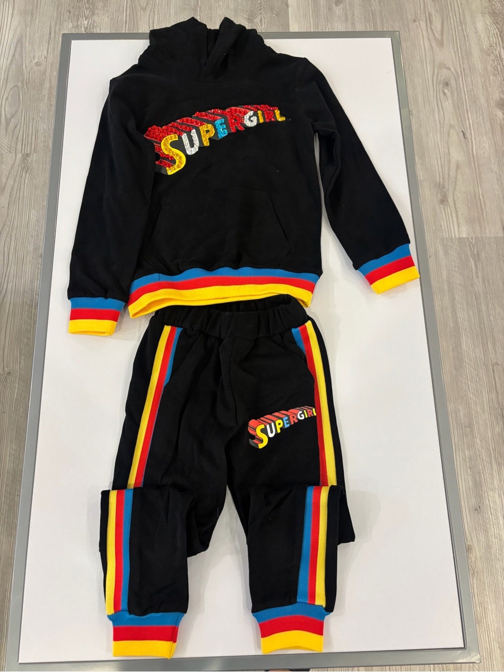 DC Black Supergirl Hoodie & Jogger Set with Red Yellow Blue Trim